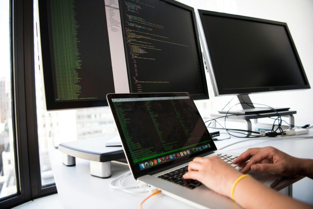 Close-up Photo of Person typing on Laptop